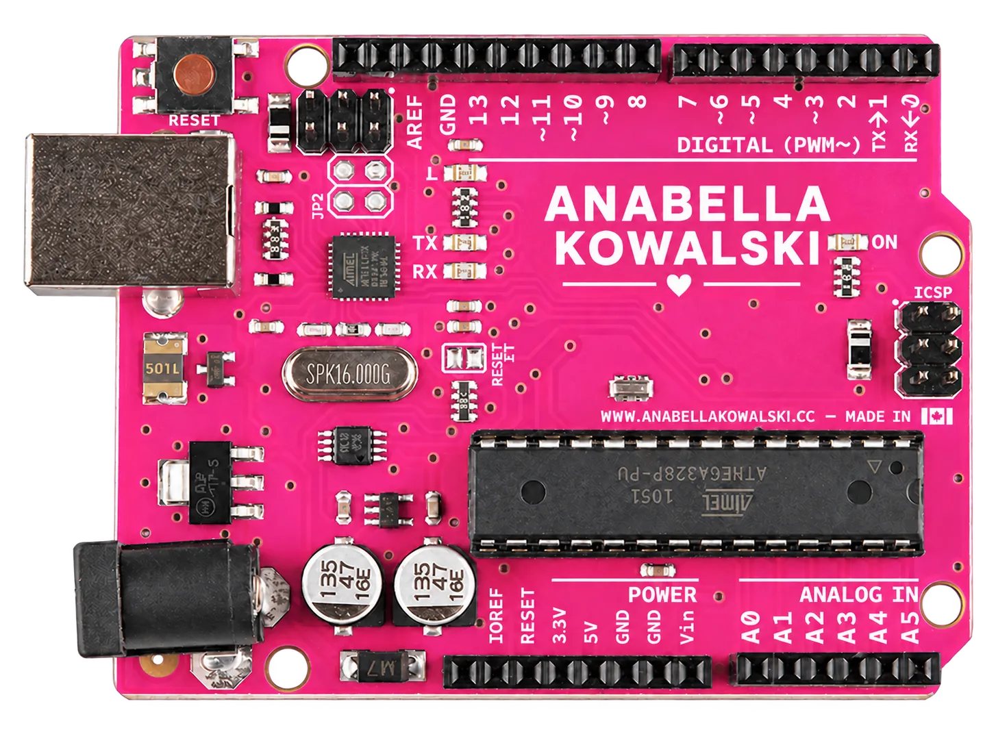 Pink circuit board with Anabella Kowalski printed on it